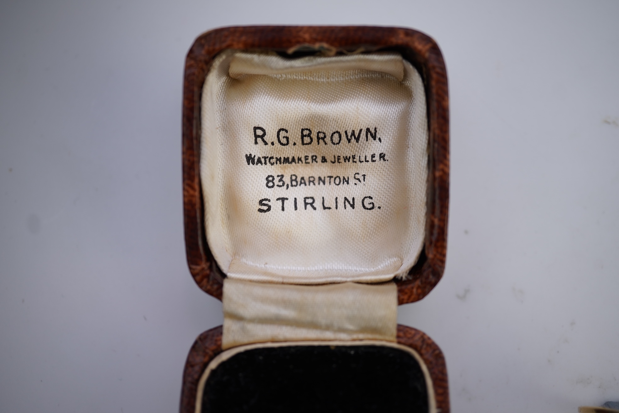 An enamel ring and a hardstone swivel fob seal
